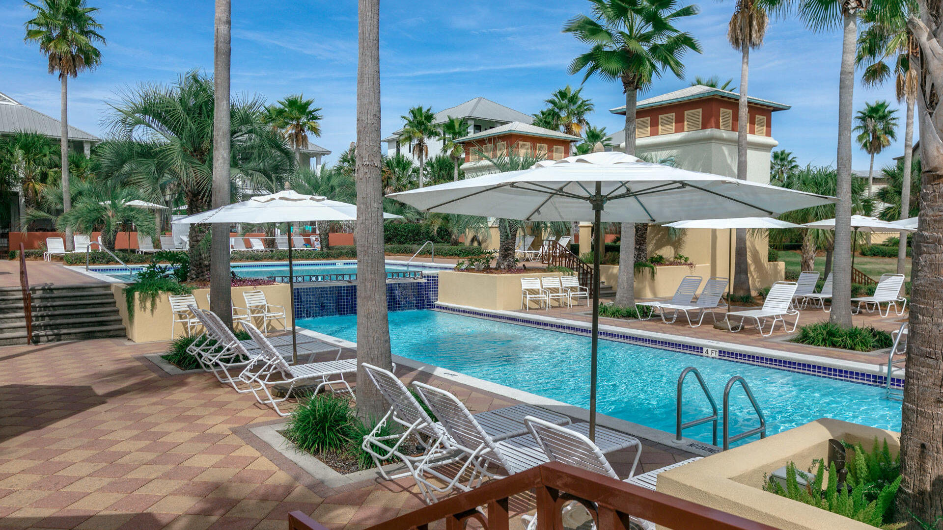 Seacrest pool chairs and umbrella